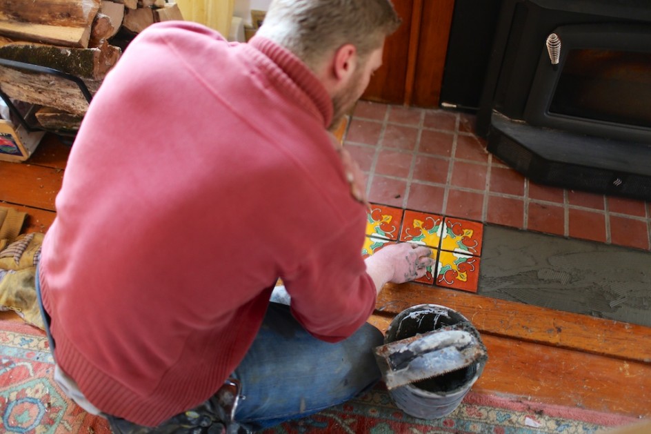 Ben laying tiles