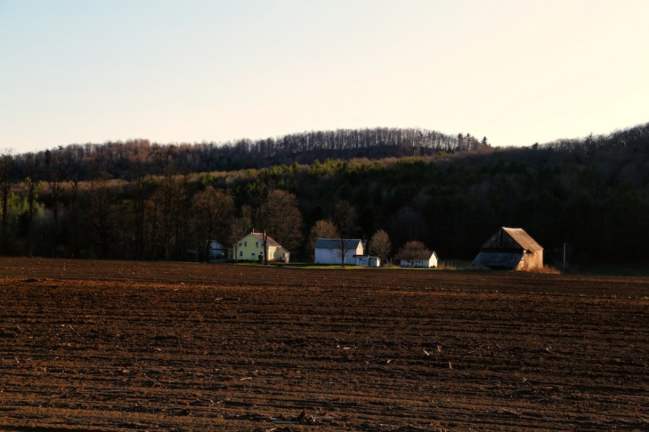 Plowed Fields And Farmhouse