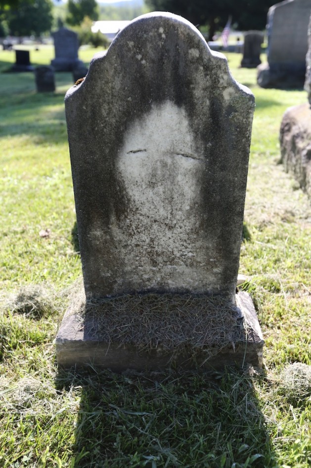 Face On A Tombstone